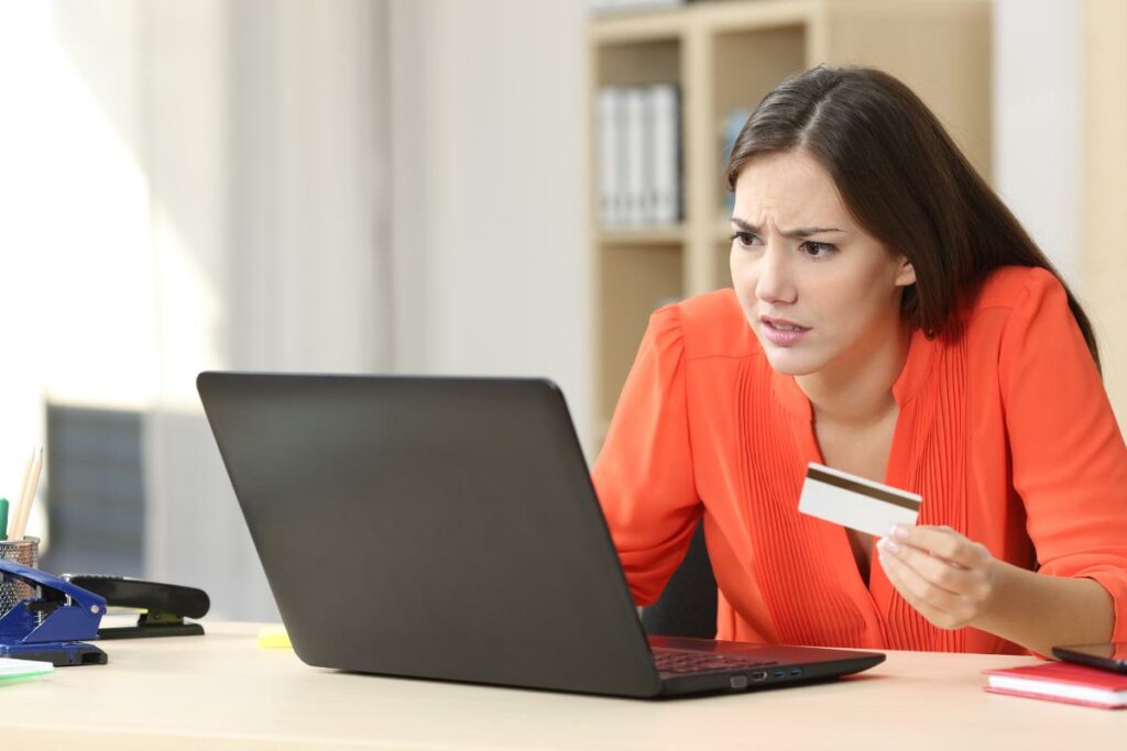 woman looking concerned when buying online